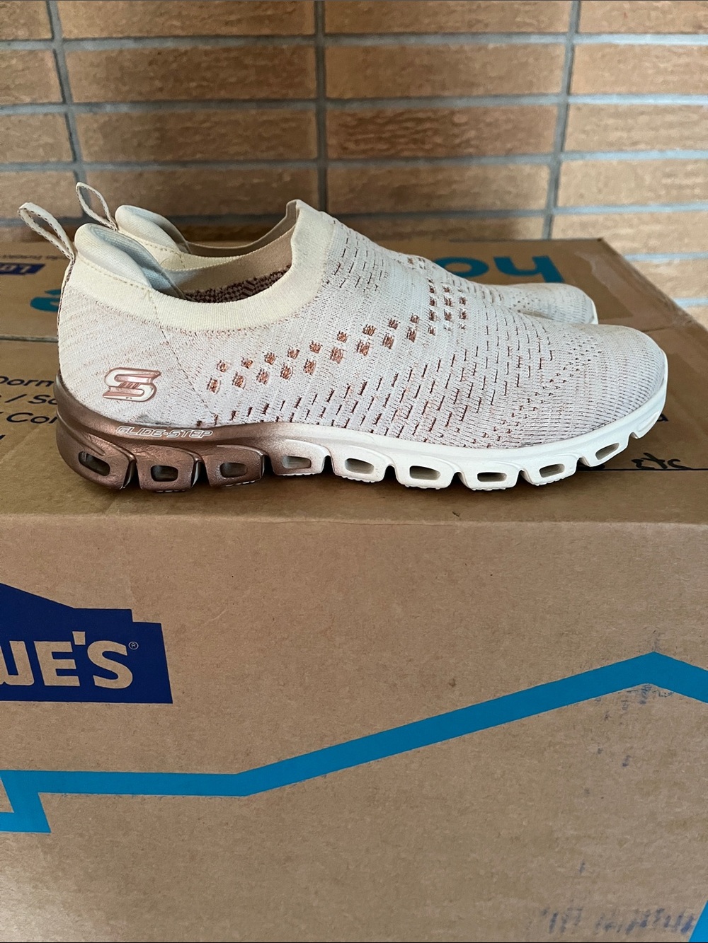 Skechers Women’s Slip-On Sneakers in Cream with Rose Gold Accents